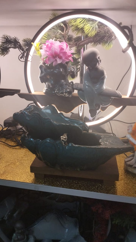 Budha fountain with ringlight