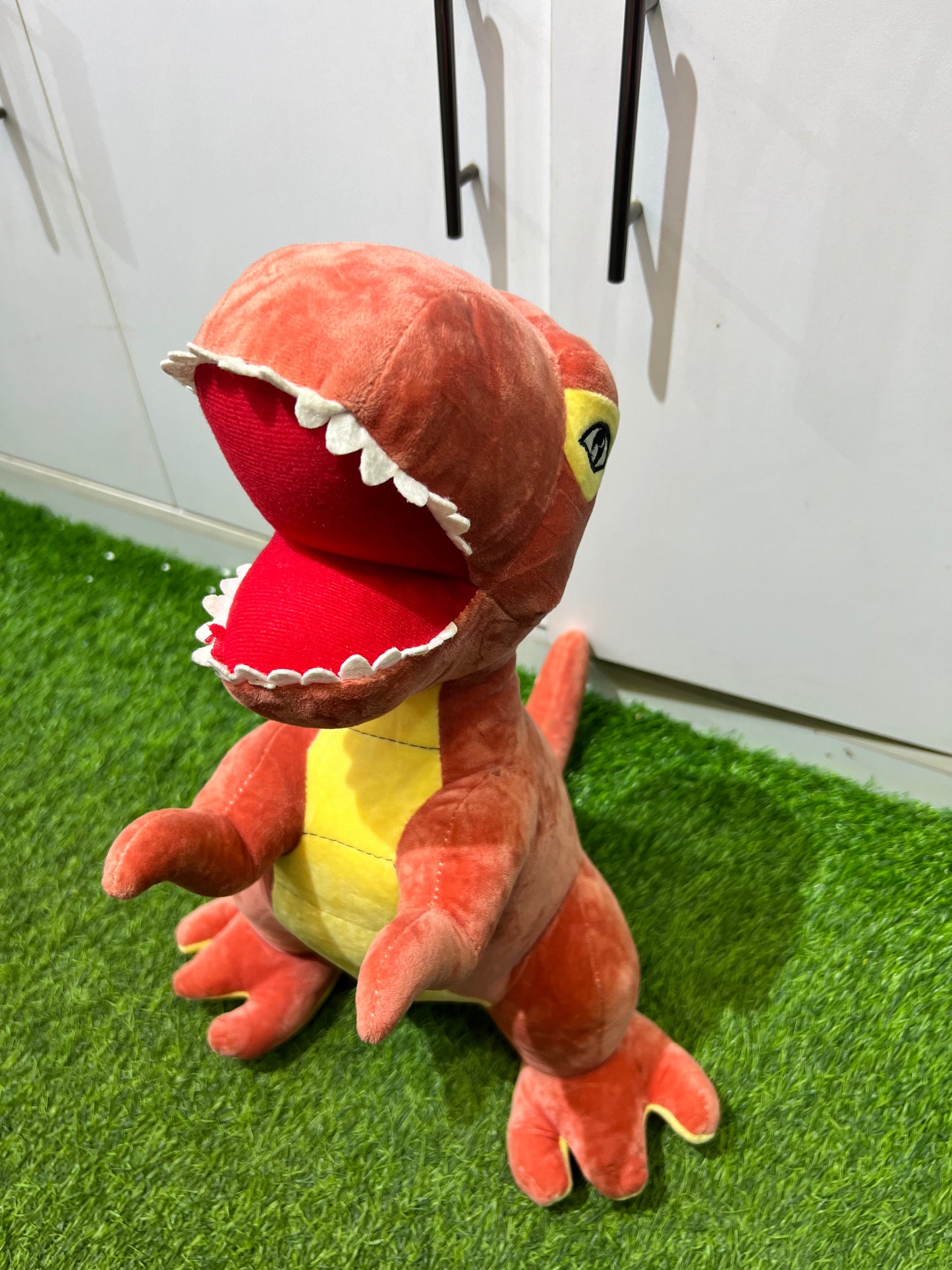 Plush dinosaur toy